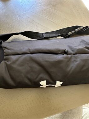 Under Armour Black Handwarmer with White Logo for football.